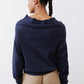 Navy cowl-neck sweater back view with long sleeves and banded hem