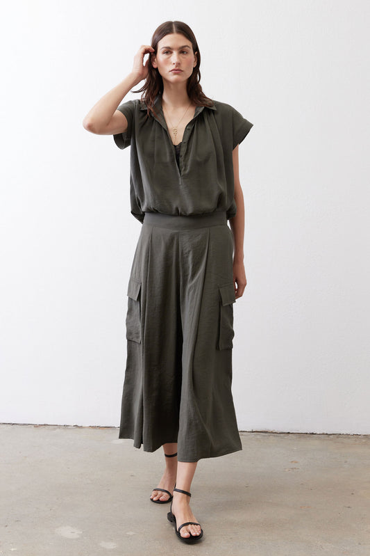 Oversized voile blouse in dark olive, short sleeves, V-neck button front, draped hem