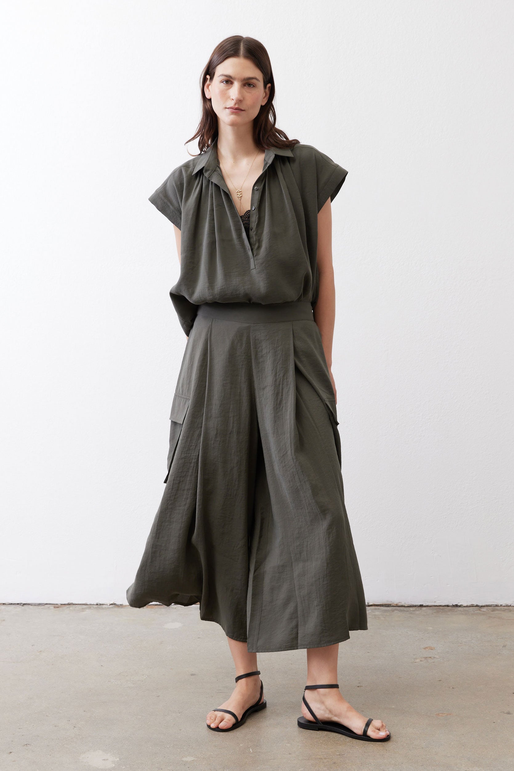 Oversized voile blouse in dark olive with short sleeves and V-neck button placket