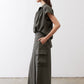 Olive cargo skirt pants with hip cargo pocket and relaxed wide-leg drape