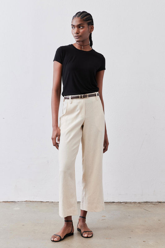 Oat linen A-line pants, high-rise fit with wide straight legs and ankle length.
