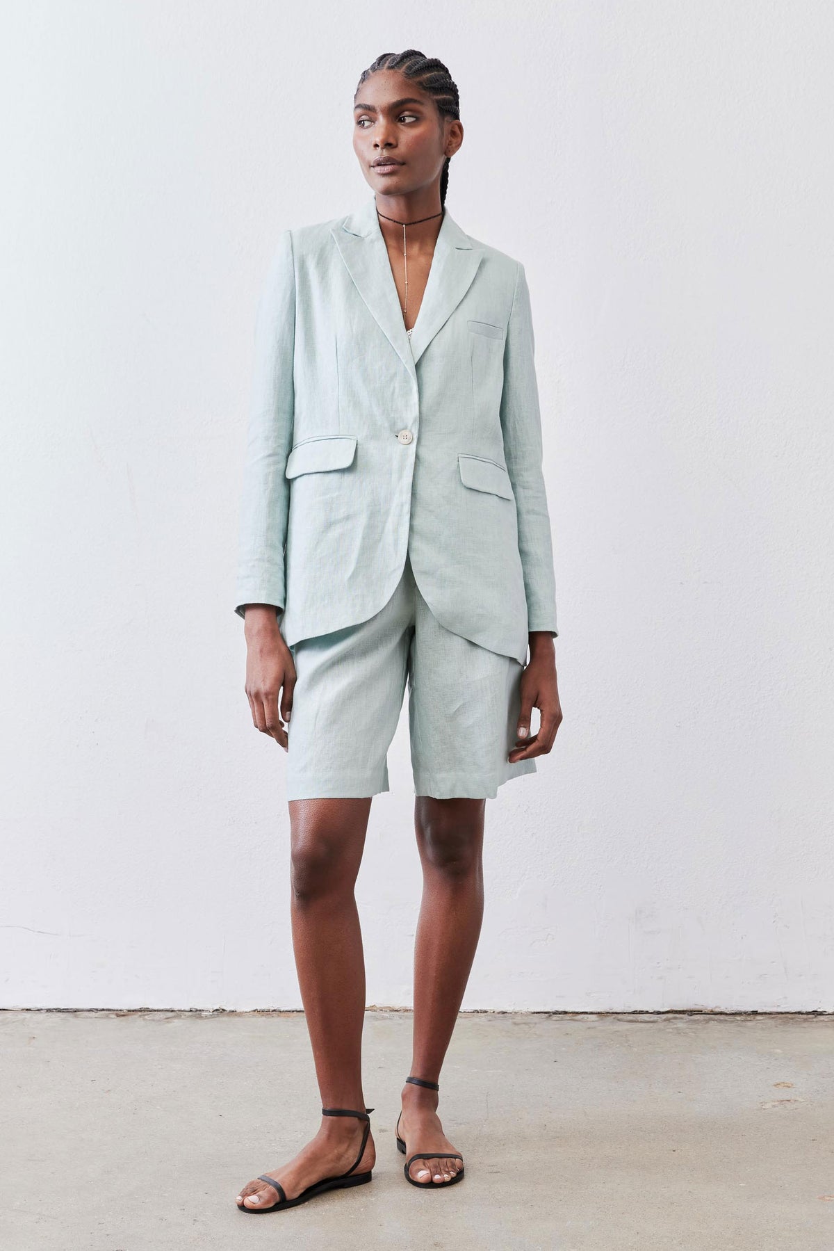 Mint linen blazer with notch lapels and flap pockets, single-button front, cropped full body view