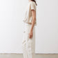 Off-white silk blouse side view with short sleeves and relaxed drape