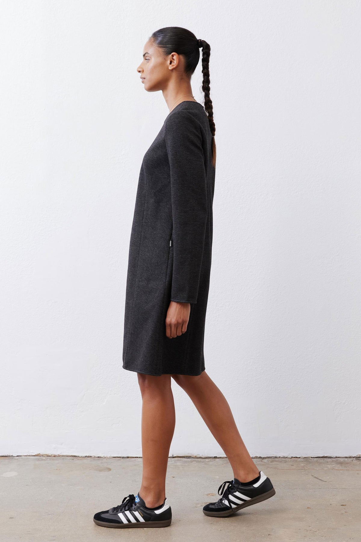 Charcoal herringbone long-sleeve ponte pocket dress, side profile with straight skirt