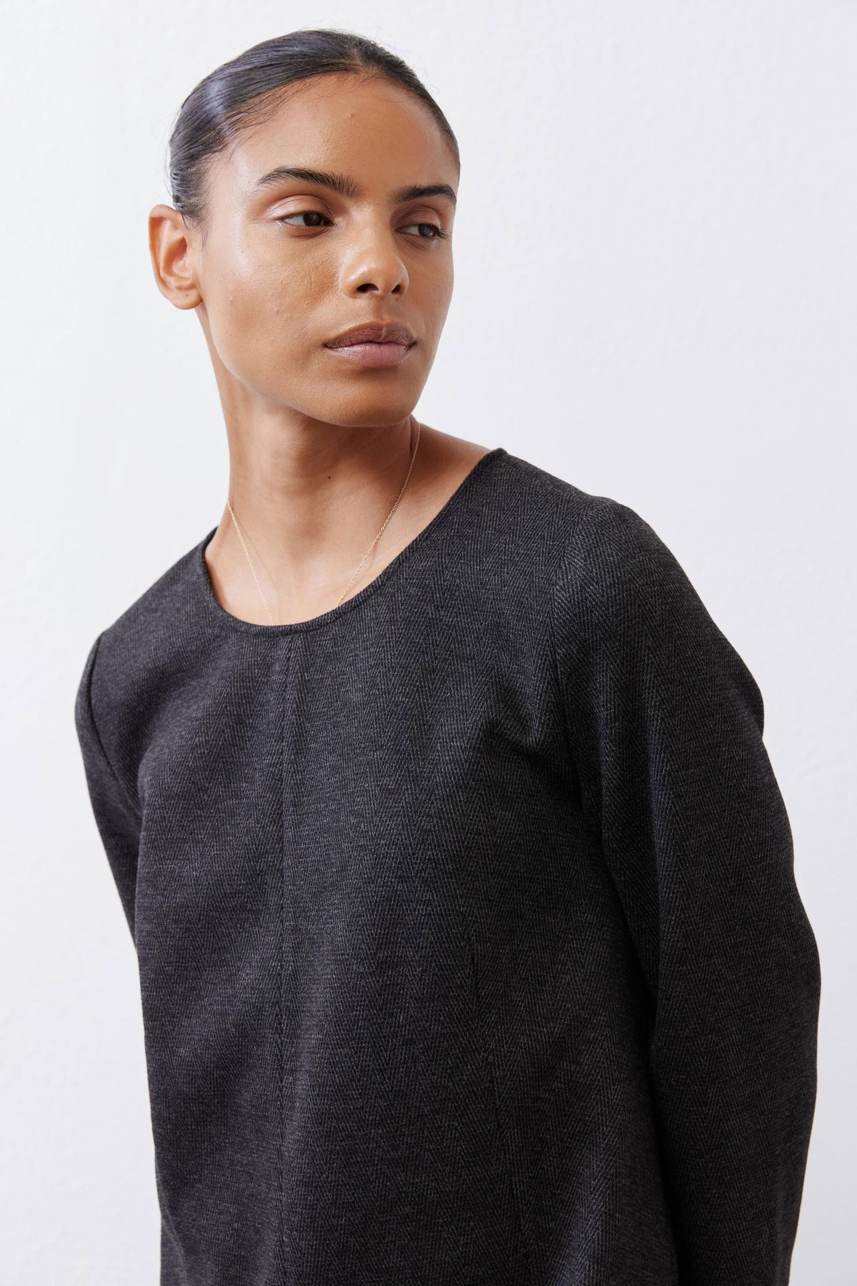 Charcoal herringbone long-sleeve ponte pocket dress close-up of crew neck and texture