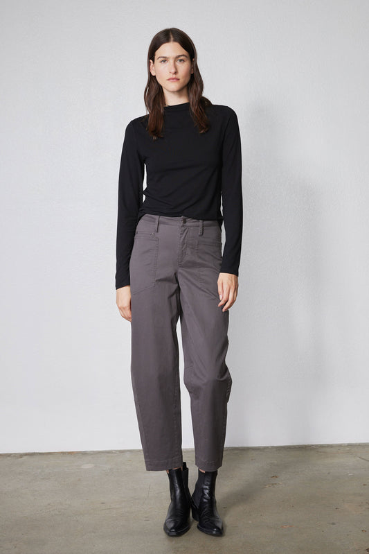 Black long-sleeve shoulder detail top with high neckline, front view