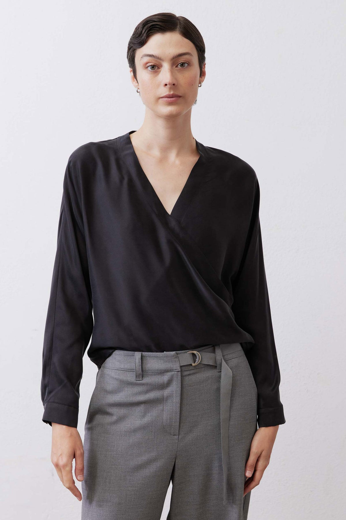 Black long sleeve wrap silk blouse with V-neck and relaxed crossover fit