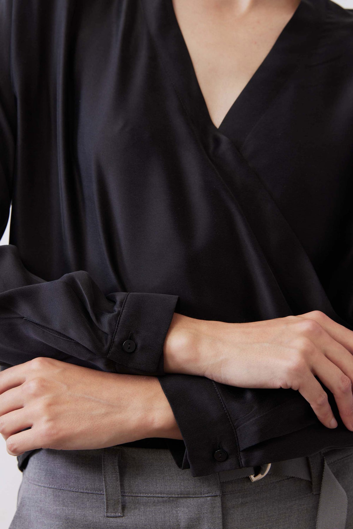 Black wrap silk blouse cuff with button and V-neck crossover overlap