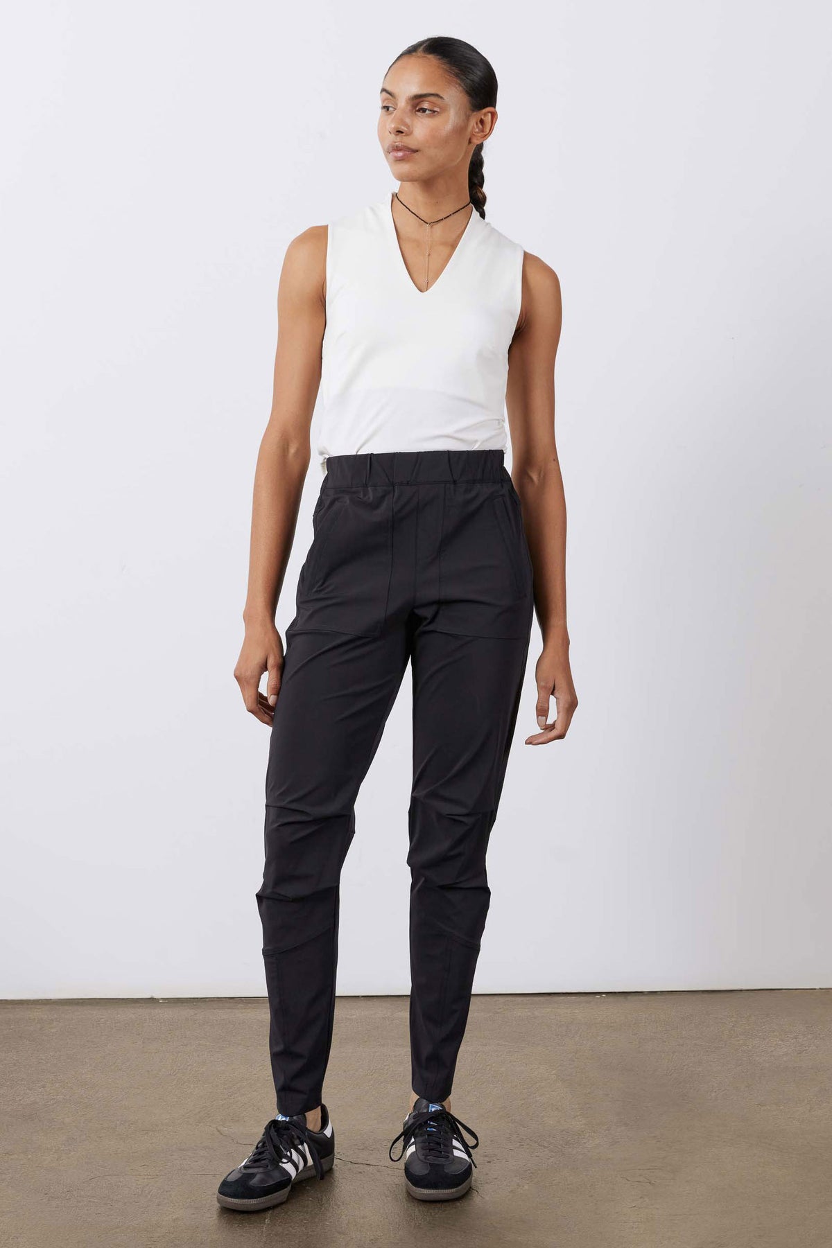 Black jogger pants with elastic waistband and slim tapered fit