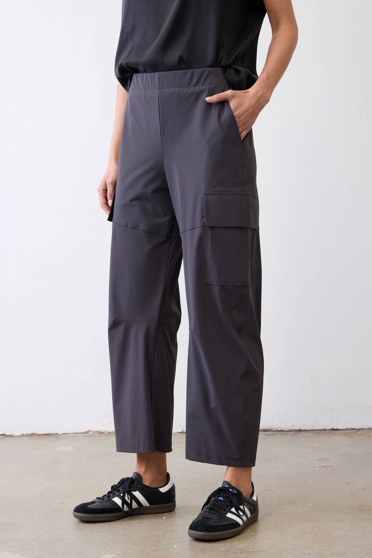Graphite cargo utility pants with thigh flap pocket and relaxed tapered fit