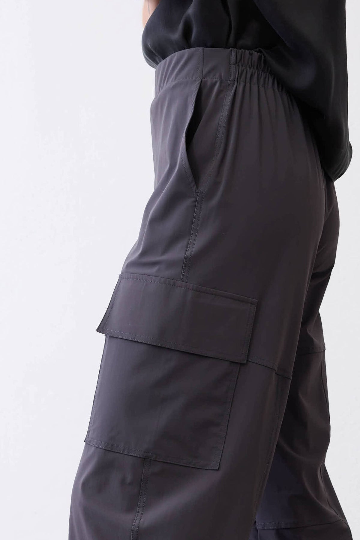 Graphite utility pants with elastic waist and layered cargo pocket at thigh