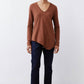 Bark brown v-neck long sleeve top with relaxed fit and curved hemline