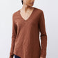 Bark brown v-neck long sleeve top with curved front hem and relaxed fit