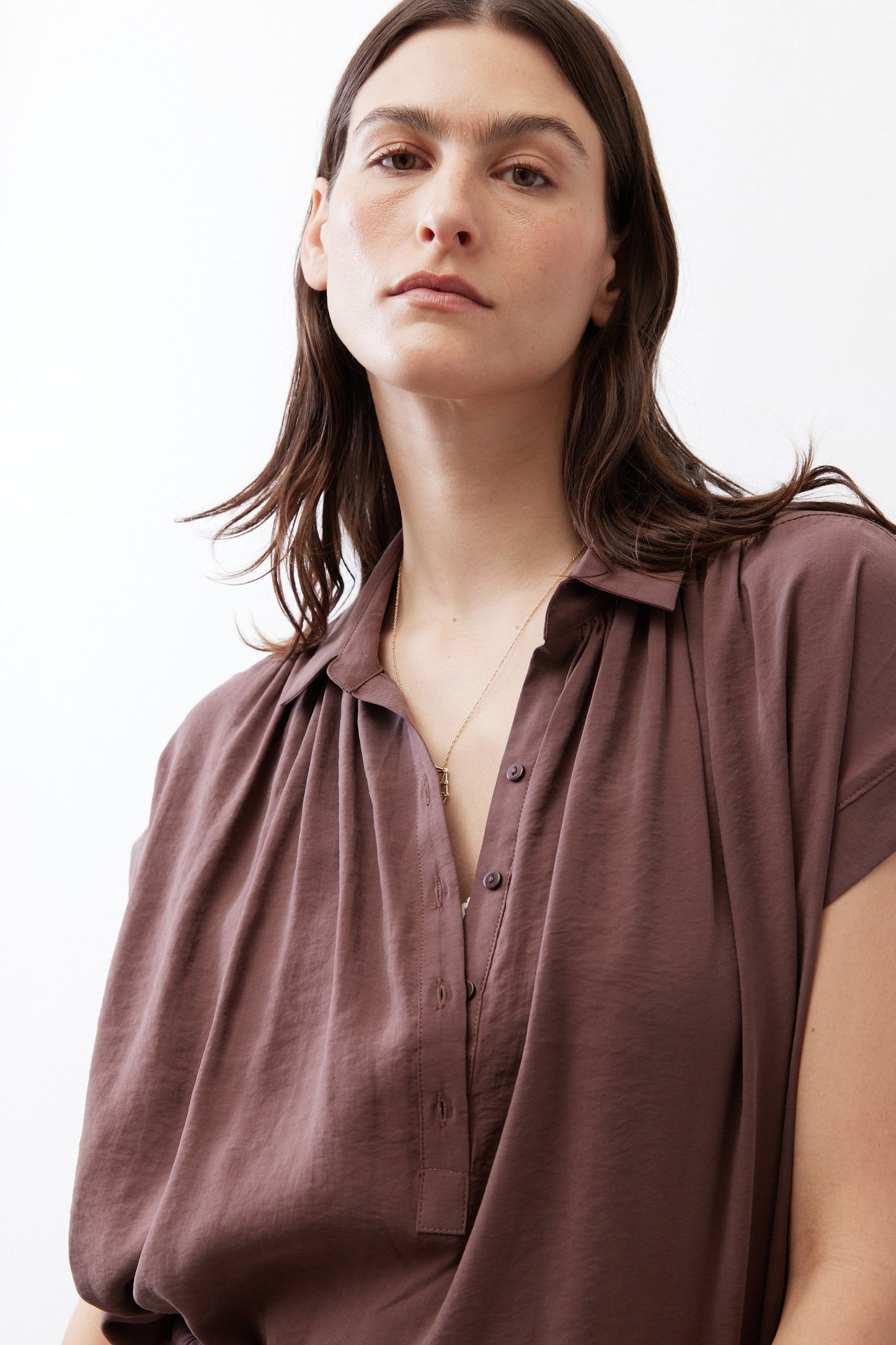 Oversized voile blouse in dark brown, V-neck button placket, draped short sleeves