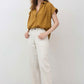 Oversized honey-gold blouse with short sleeves and half-button placket