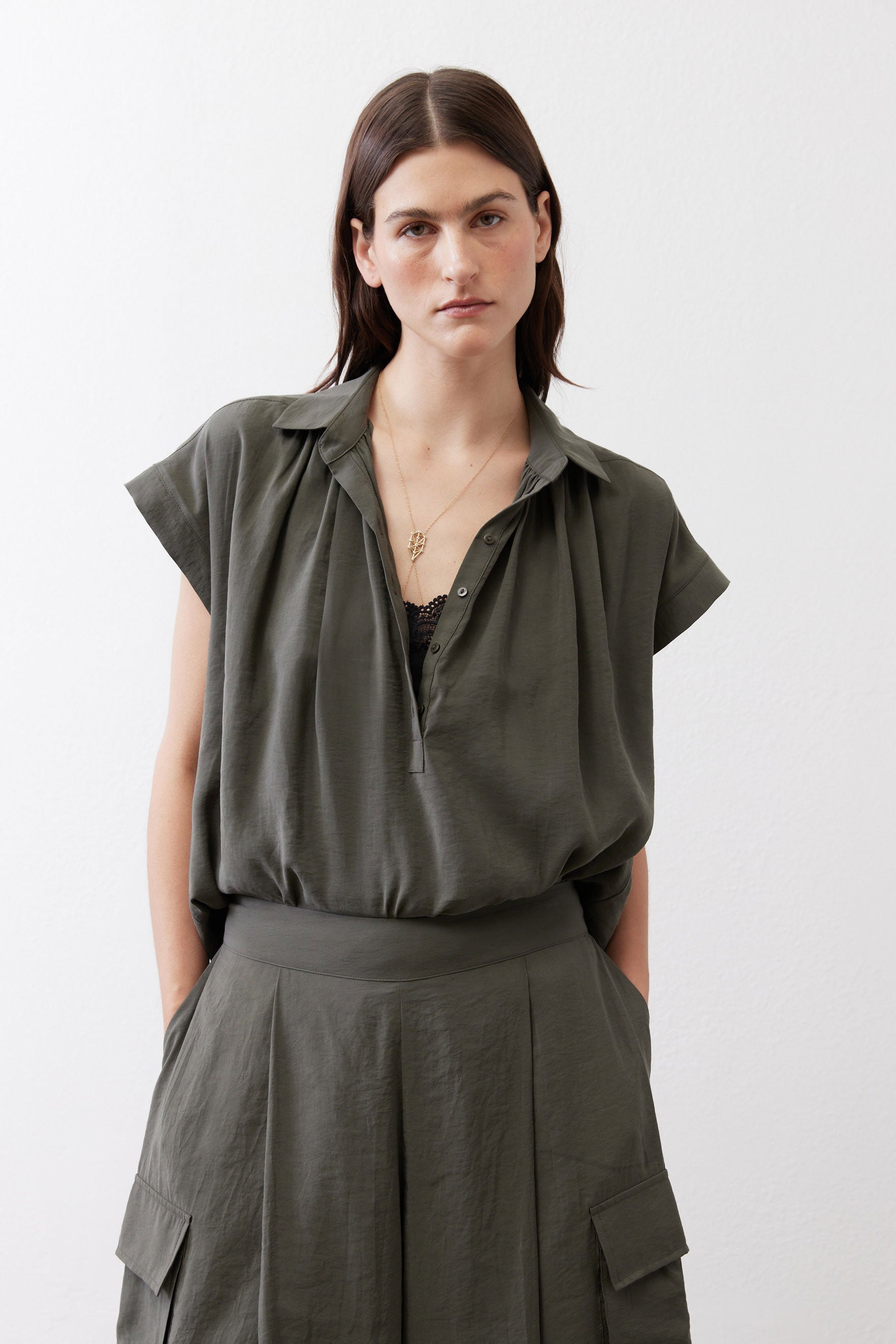 Oversized voile blouse neckline, dark olive, open collar, button placket, relaxed shoulders