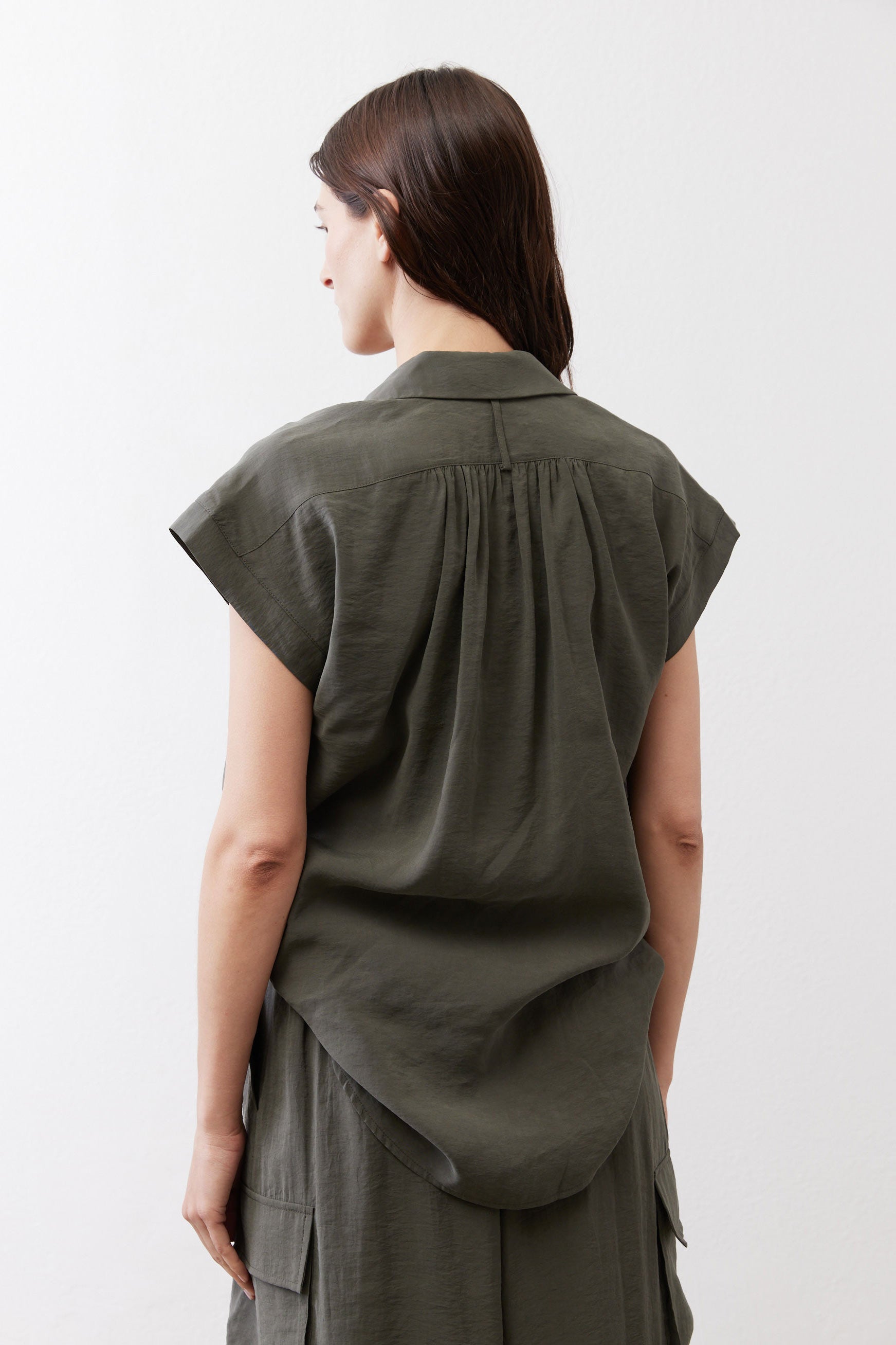 Oversized voile blouse back view, dark olive voile, short sleeves, gathered yoke