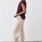 Malbec silk blouse in side profile: short sleeves, button-front, loose fit