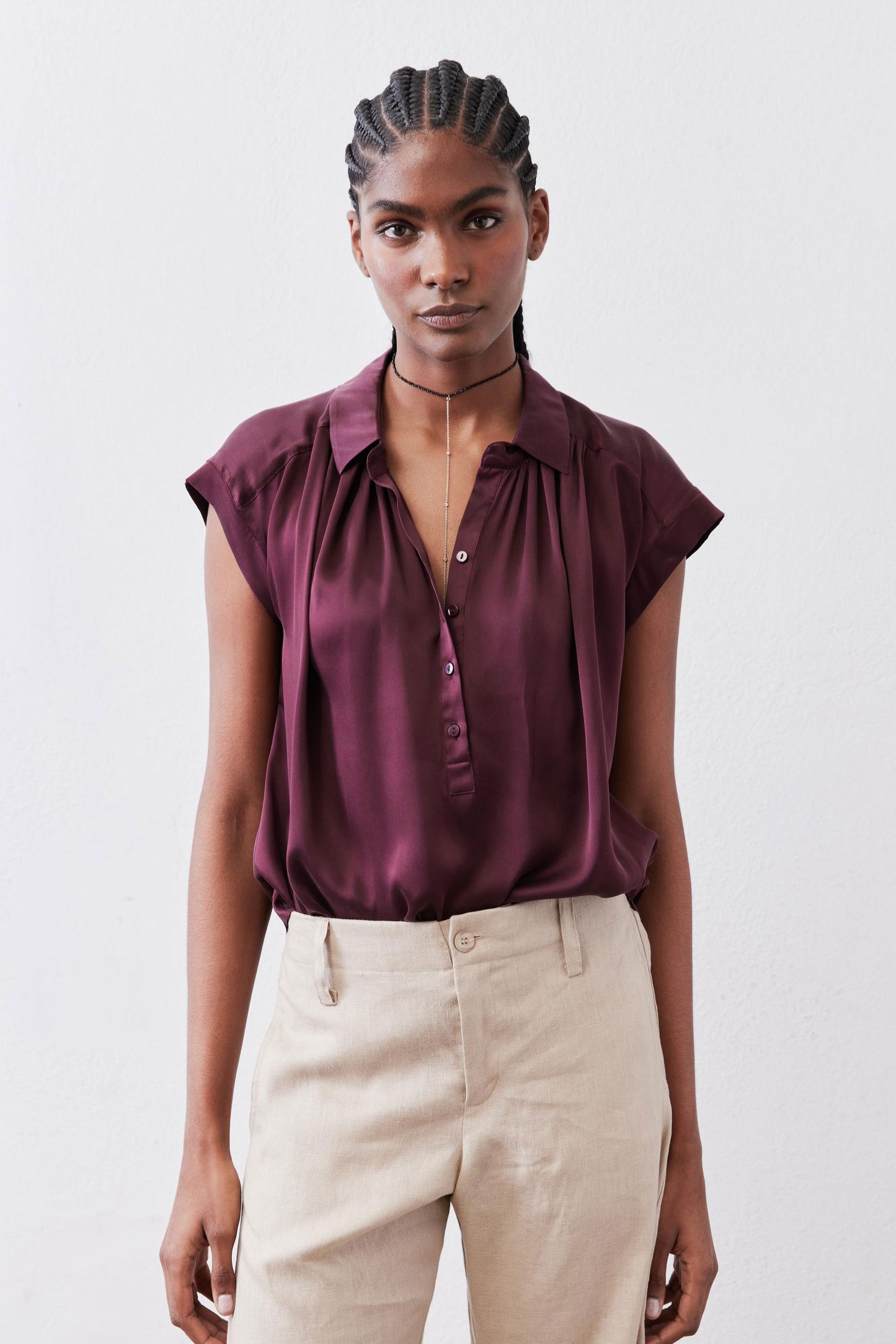 Malbec oversized silk blouse with short sleeves, button-front, and relaxed silhouette