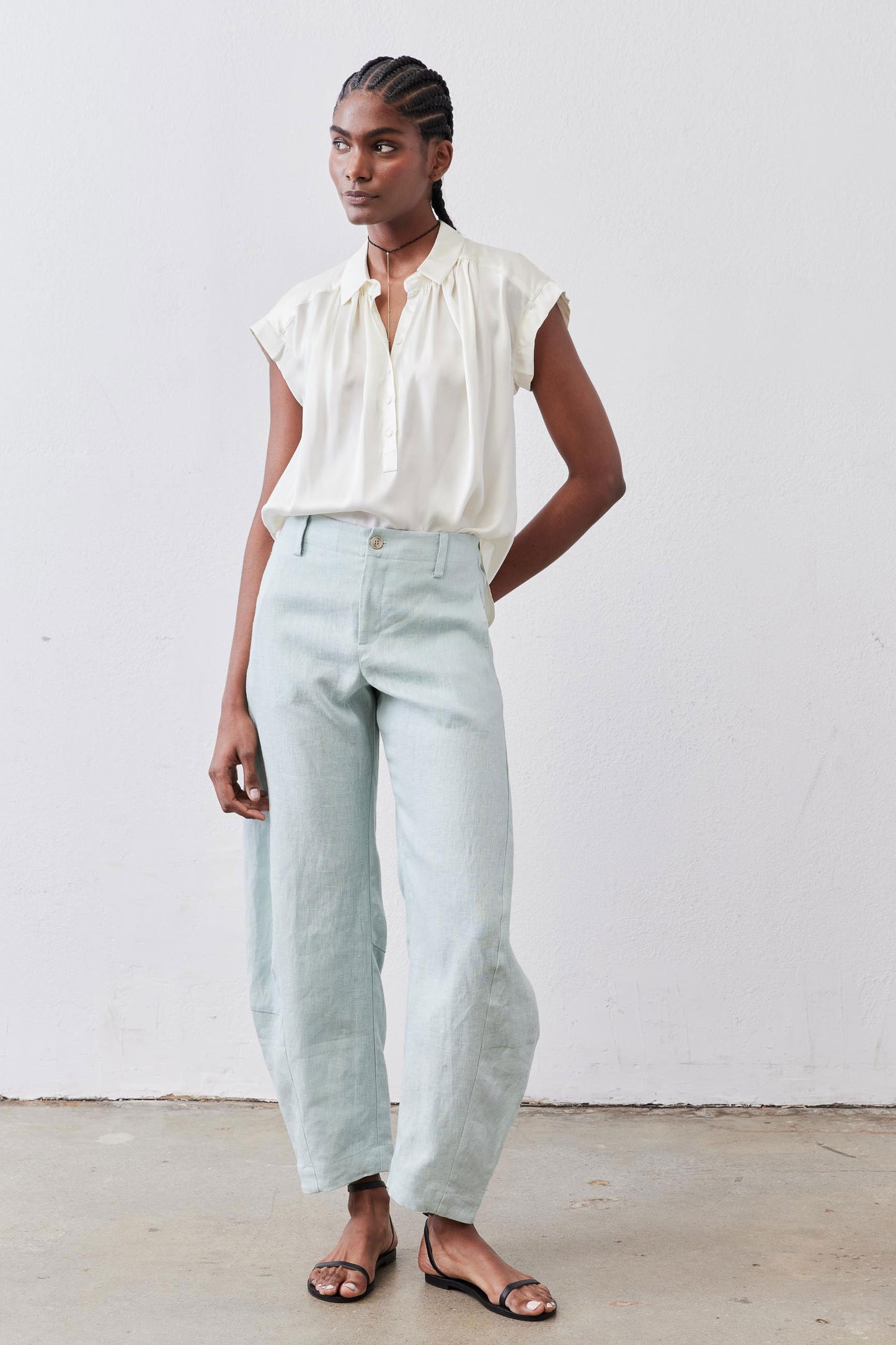 Ivory silk blouse with pointed front collar tips and short sleeves