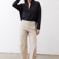 Black oversized tunic with point collar and button-front, long sleeves