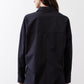 Black oversized tunic back view with point collar and button placket