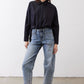 Black oversized tunic with point collar and button-front, long sleeves
