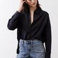 Black oversized non-iron tunic with point collar and button-front, long sleeves