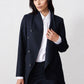 Navy pinstripe asymmetric suit jacket, open lapel and button placket, long sleeves