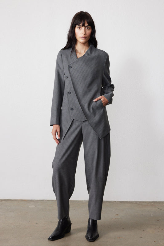 Gray pinstripe asymmetric suit jacket with angled front panel and long sleeves