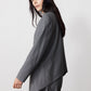 Gray pinstripe asymmetric suit jacket with long side-draped back hem