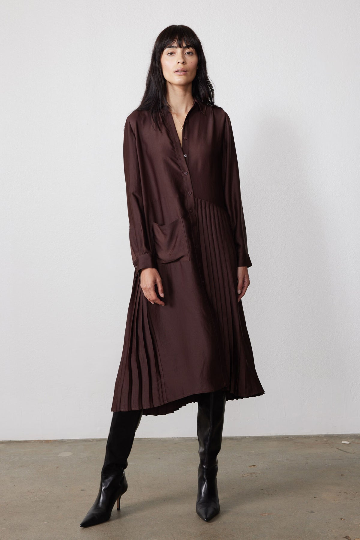 Coffee bean brown long-sleeve dress with button front, asymmetrical pleated hem, pockets