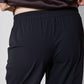 Black work pants with elastic waistband and relaxed drape