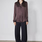 Black wide-leg work pants with relaxed fit and straight leg opening