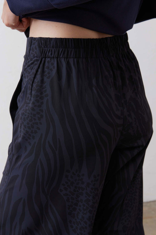 Petite loose work pants with elastic waistband, dark navy animal-print fabric