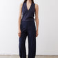 Loose navy work pants with V-shaped yoke seam and elastic waistband, wide straight legs