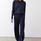 Navy work pants with elastic waist, relaxed fit, and ankle-length wide legs