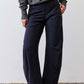 Petite dark navy work pants with relaxed straight legs and side seam pockets.