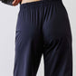 Dark navy work pants with wide elastic waistband and relaxed straight-leg fit.