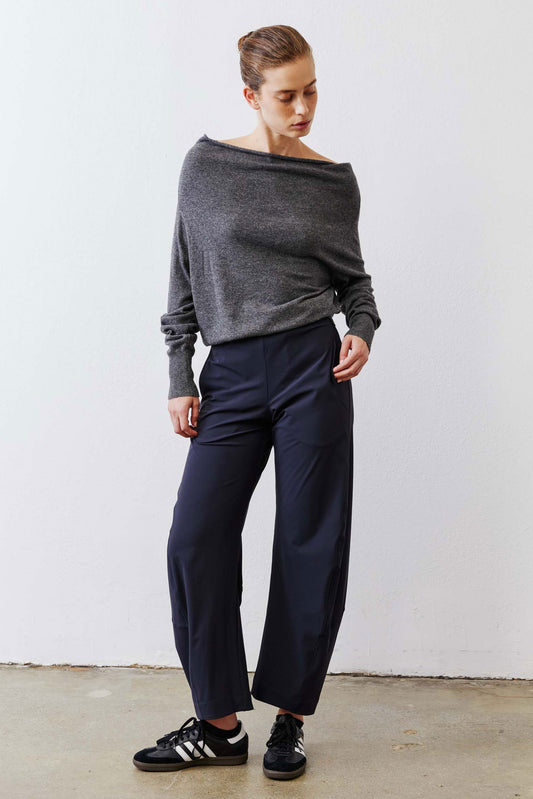Petite dark navy work pants, relaxed ankle-length style with elastic waistband.