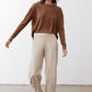 Light beige loose work pants with relaxed fit and ankle-length straight leg