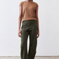 Olive green loose work pants with elastic waist and relaxed ankle-length silhouette