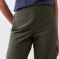 Olive green loose work pants with elastic waist and front seam detail, close-up