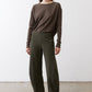 Olive green loose work pants with tapered legs and elastic waistband, full view