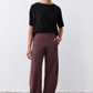 Loose work pants in aubergine, wide-leg ankle length with front pockets