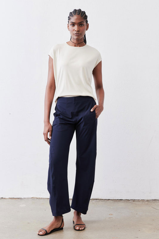 Petite work pants in deep navy, ankle-length relaxed fit with elastic waist