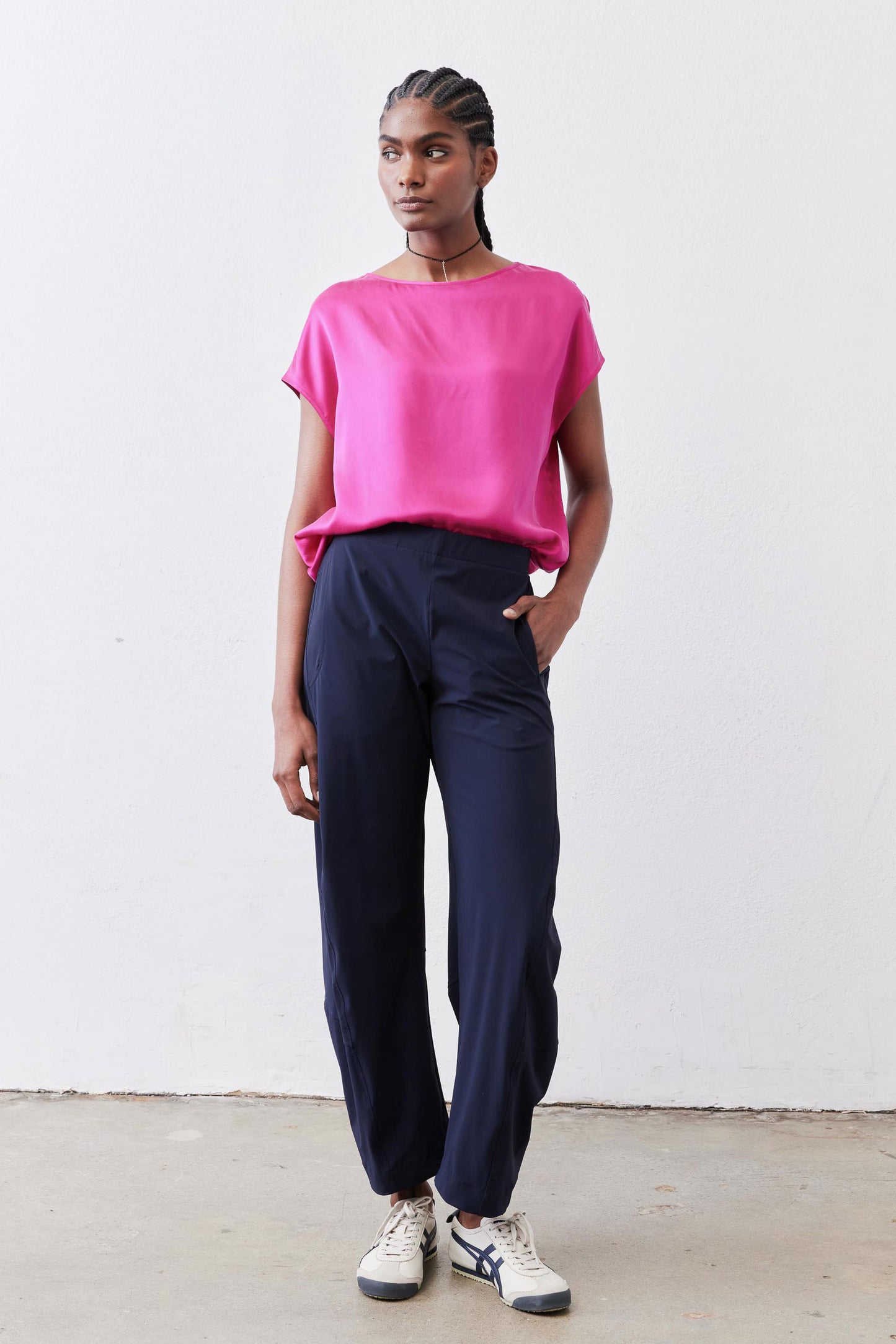 Navy work pants with relaxed leg, elastic waistband, and drawstring tie