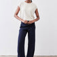 Navy loose work pants with elastic waistband and wide straight legs, cropped at ankle