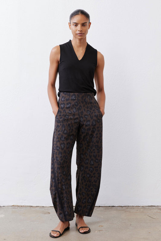 Loose work pants in dark leopard print with relaxed straight legs and elastic waist