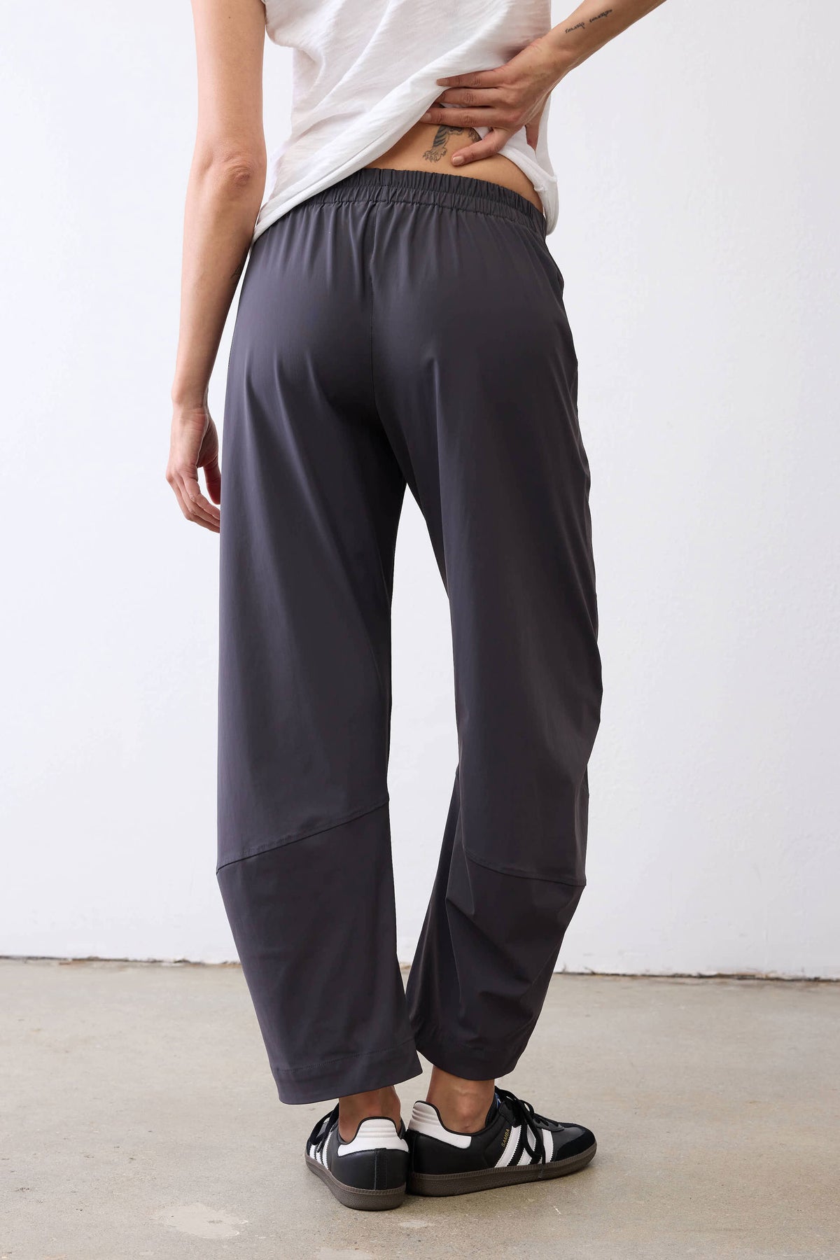 Graphite work pants with elastic waistband and relaxed, tapered legs